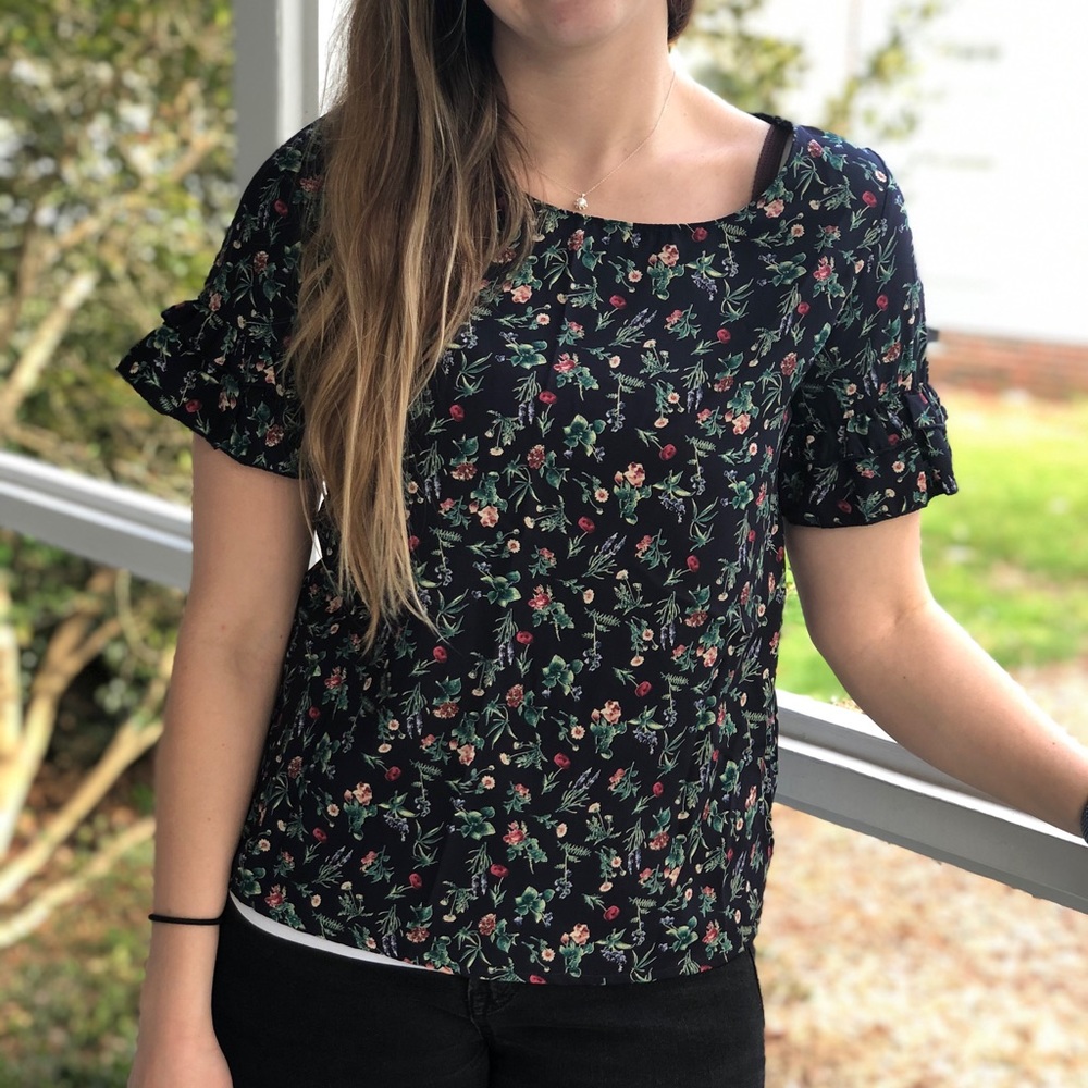 Navy floral blouse with ruffle sleeves